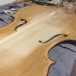 Cellos in the attic condition new bass bar
